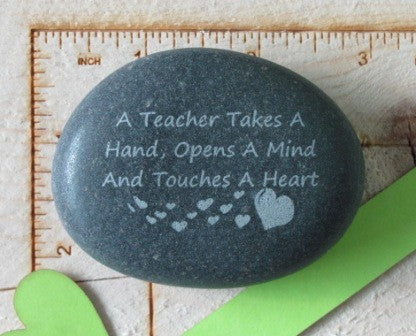 Quote- A teacher takes a hand...